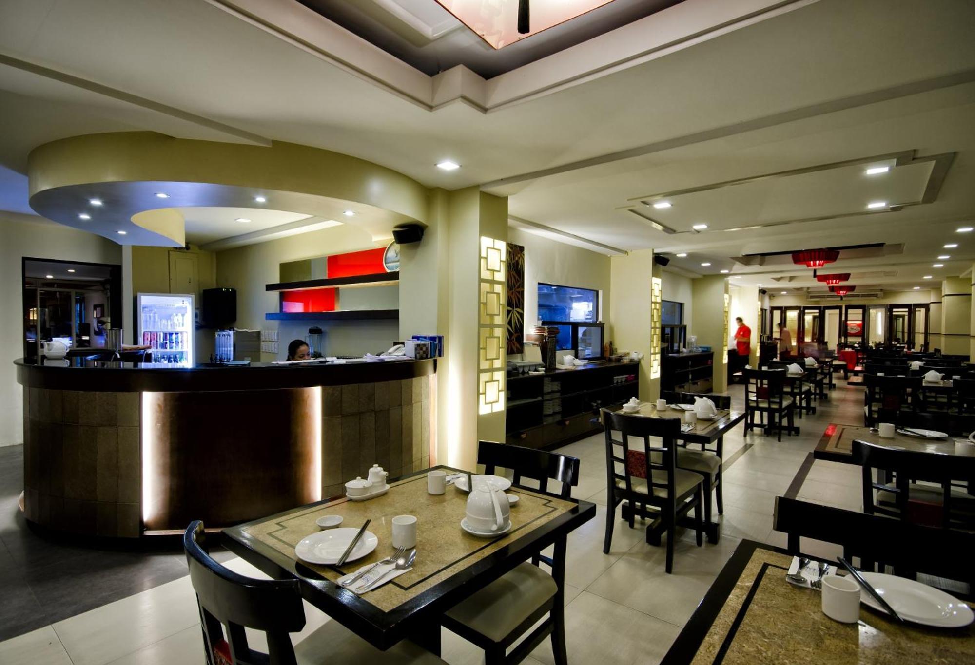Henann Regency Resort And Spa Balabag  Exterior photo Interior of a typical restaurant